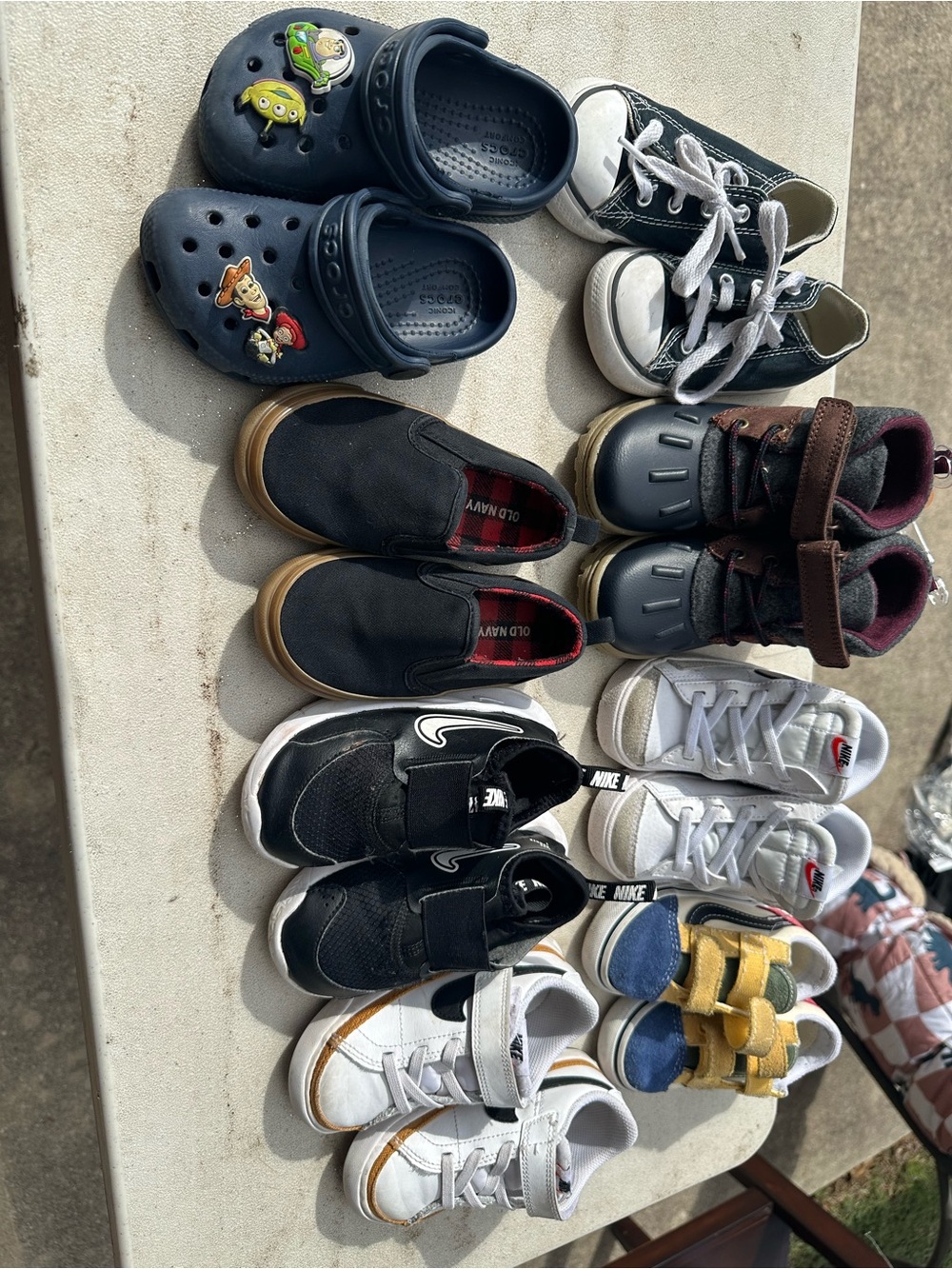 Eight pairs of boy shoes for $70